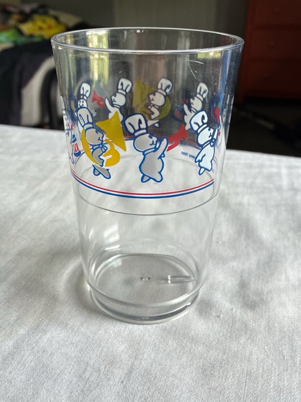 Clear Glass Tumbler with Colorful Marching Doughboy Design